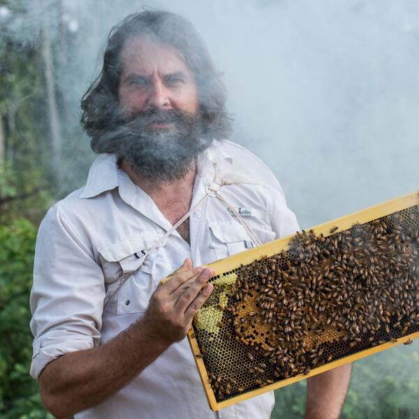 Peter Marting with frame of comb
